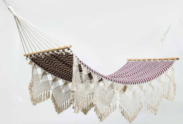Handwoven pomegranate hammock with teak bar and fringe