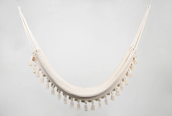 Handwoven natural cotton hammock with hand-tied tassels