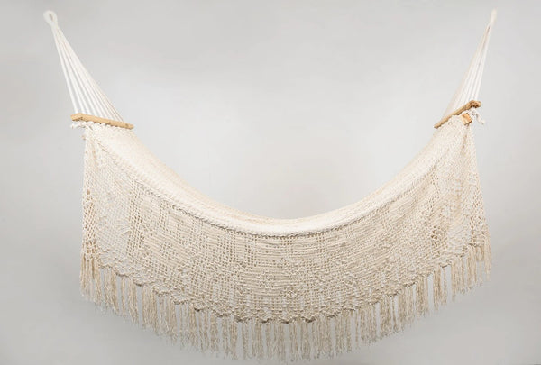Boho macramé cotton hammock with wooden spreader bar in natural color