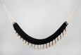 Bar-free black cotton hammock with elegant hand-tied tassels