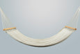 Handwoven cotton hammock with teak wood spreader bar in earth tones