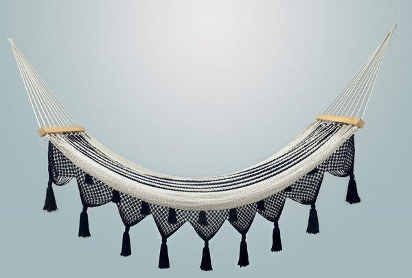 Luxury navy cotton hammock with solid teak bar and hand-tied tassels