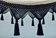 Close-up of hand-tied tassels on navy cotton hammock