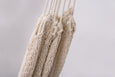 Close-up of handcrafted cotton hammock in neutral tones