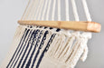 Close-up of triple weave cotton pattern in navy and natural tones, highlighting handwoven craftsmanship and durable texture.